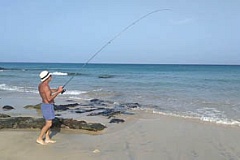 pescadores en la playa